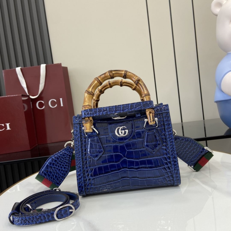 G*u*i top handle bags